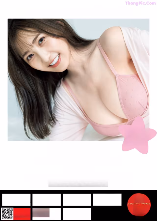 A woman in a pink bra is posing for a picture.